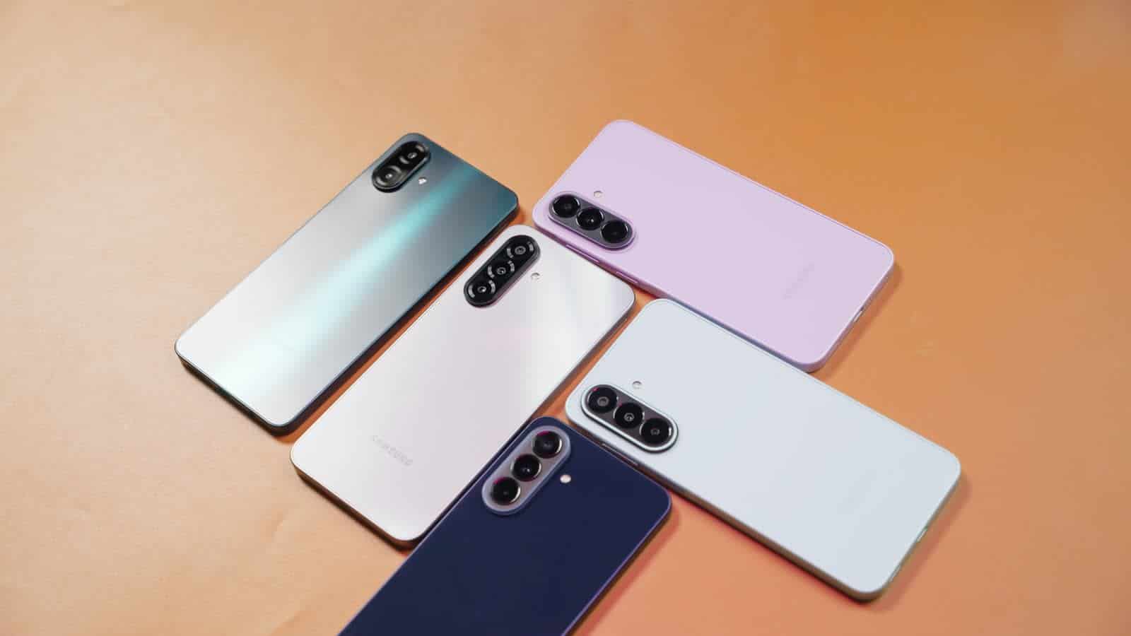The Galaxy A07, A17, A27, A37 and A57 laid out on a table, backs up